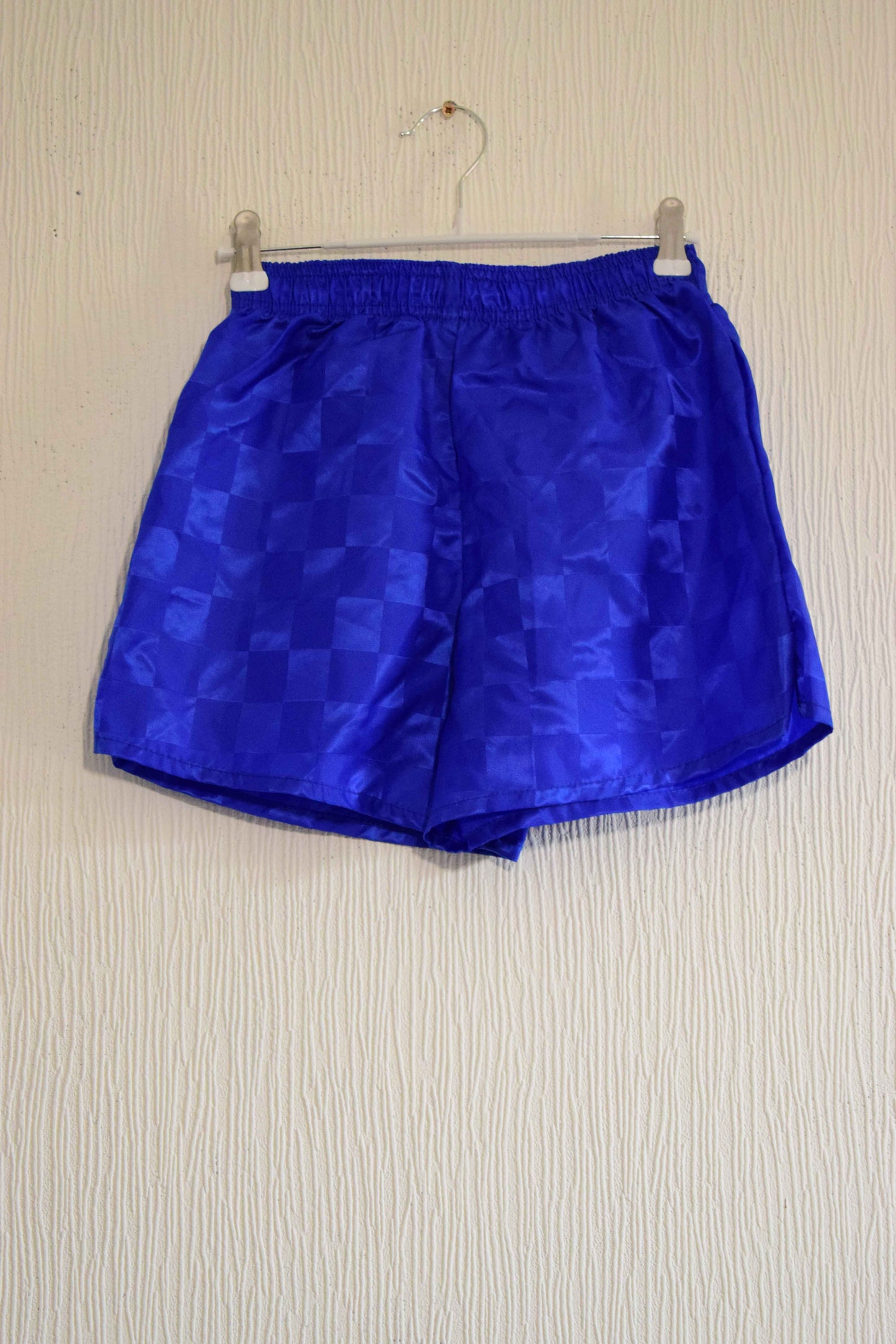 Short de sport bleu roi satiné à motif damier 10-11 Ans