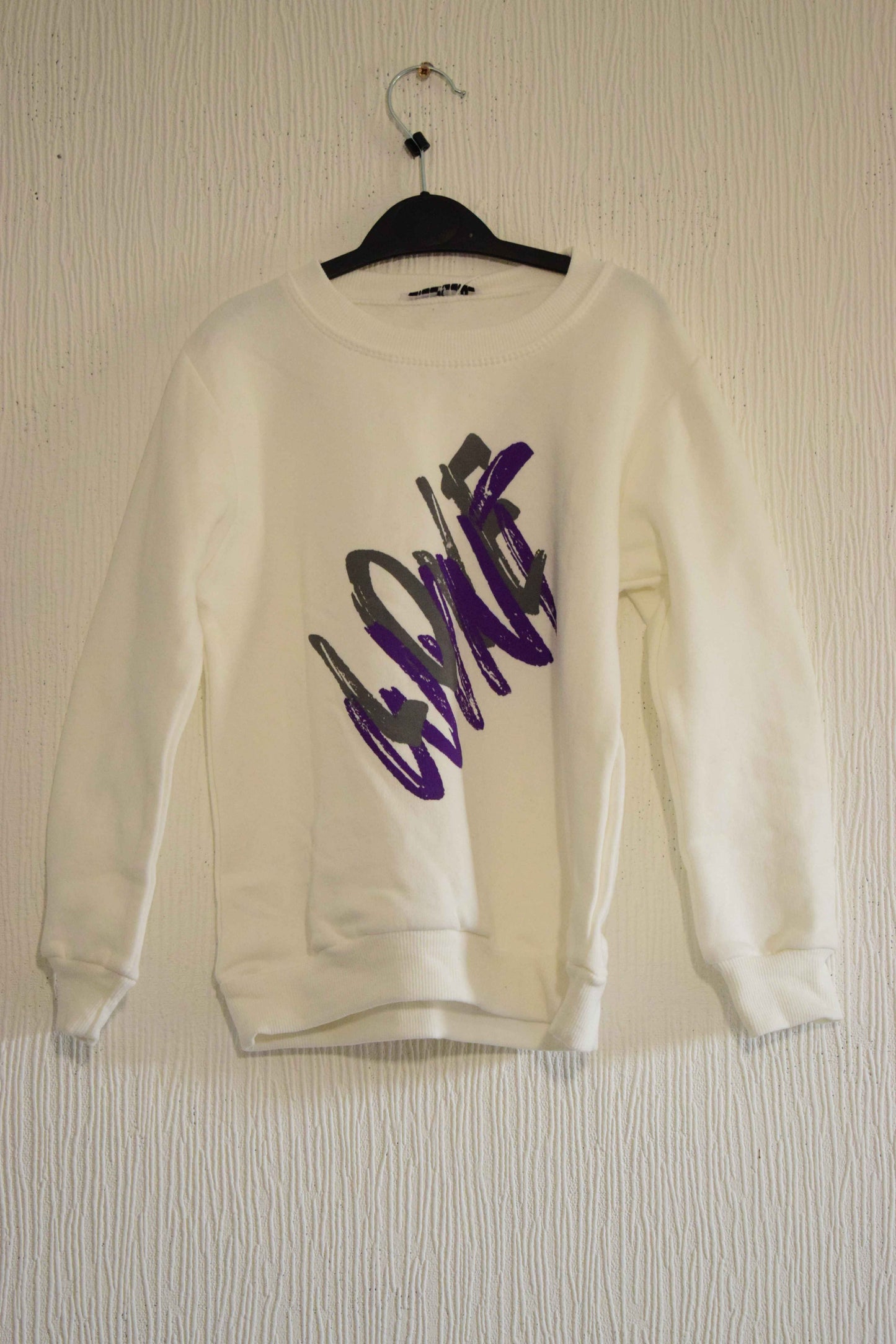 Sweat-shirt col rond blanc cassé avec imprimé graphique violet et gris 5 ans