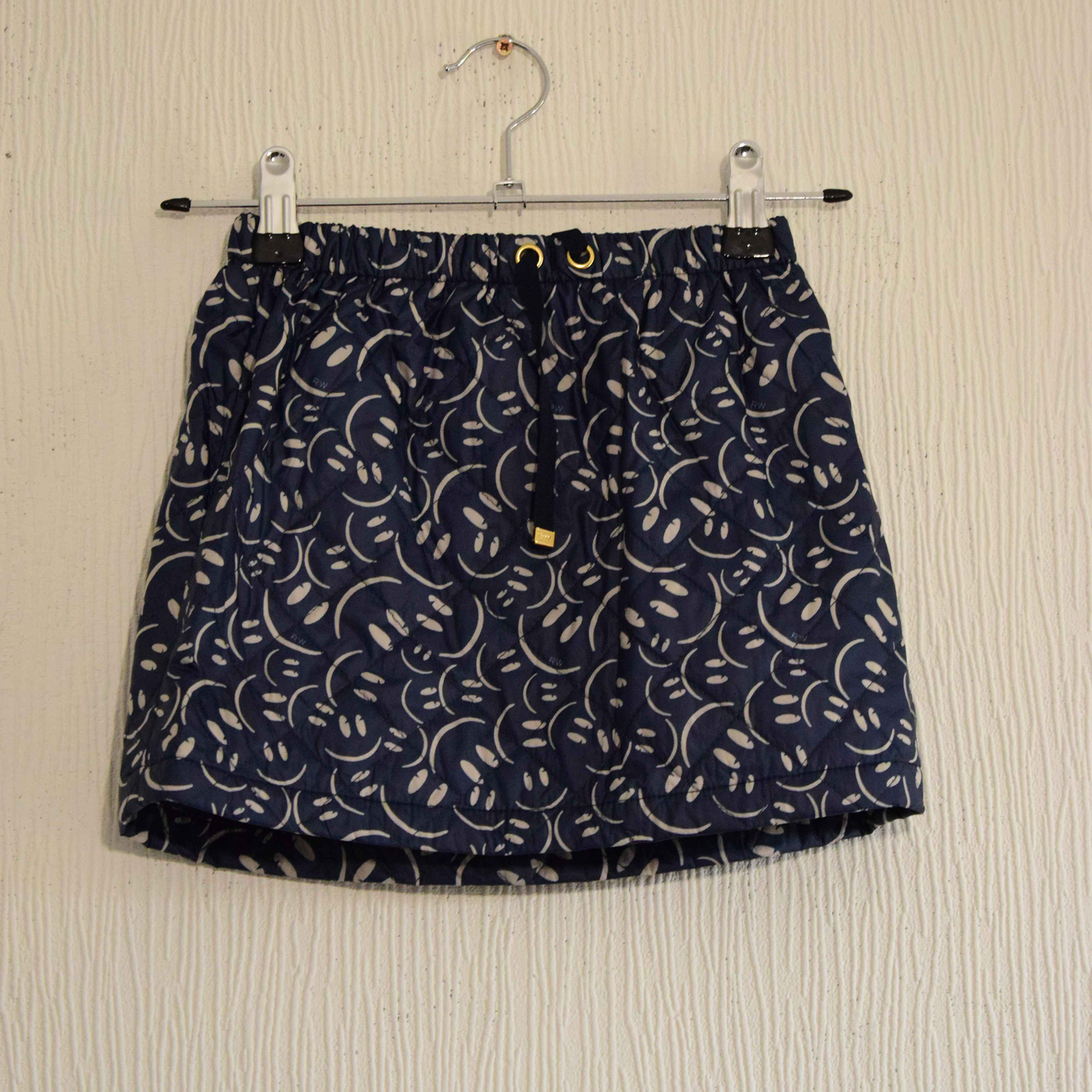 Mini Jupe matelassée bleue à motifs smileys pour fille S